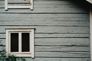 House exterior siding and window repair