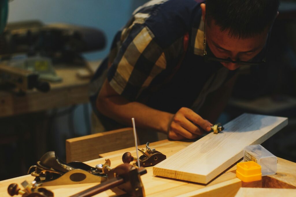 Carpenter working on wood in a workshop